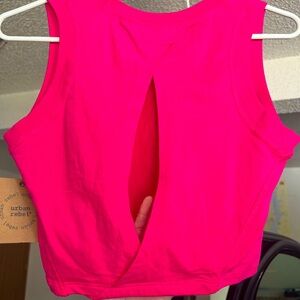 Hot pink!  Urban Rebel Athleisure top. NWT. Peek a boo back design.